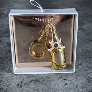 NWT /NIB champagne, key chain gold